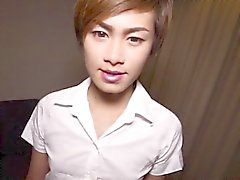 Tattooed petite thai ladyboy models her butt