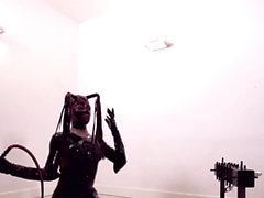 Fetish shemale in latex suit and mask fucks